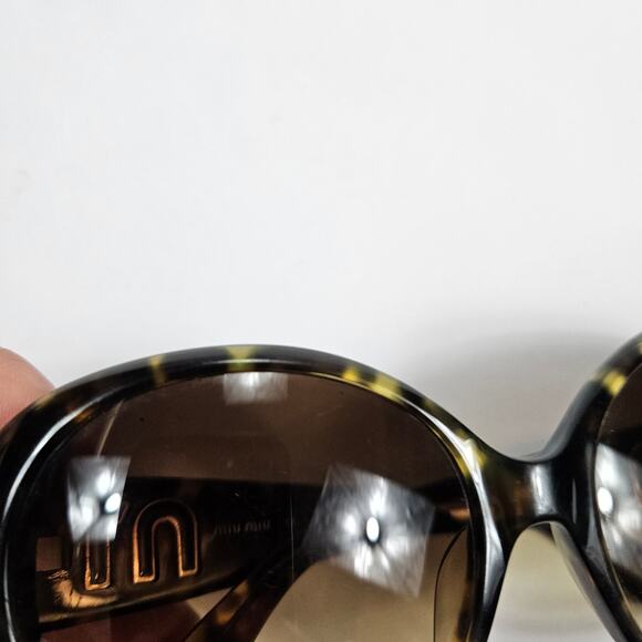 Miu Miu Sunglasses Round Tortoiseshell Gradient Lenses main image 10